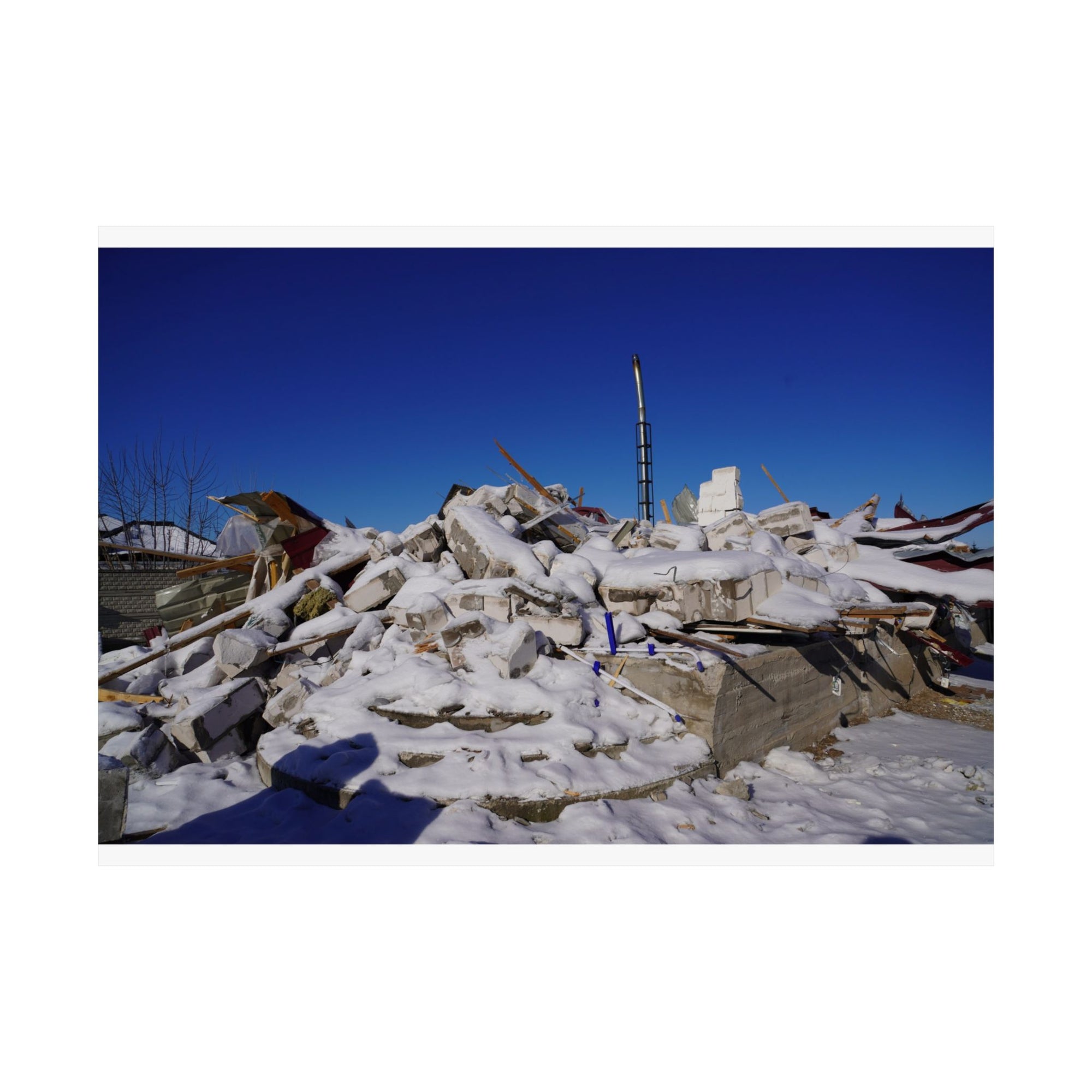 Snow on Rubble — photograph by Alex Frishberg